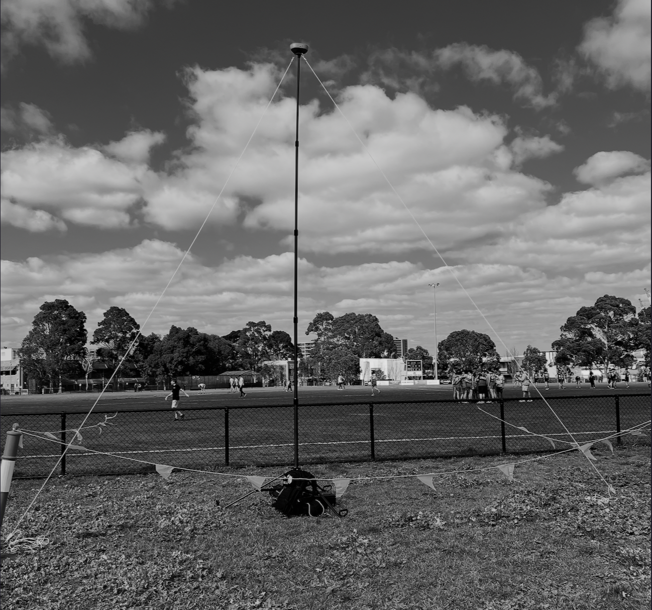 Veo Cam 3 setup on a high tripod stand on game day